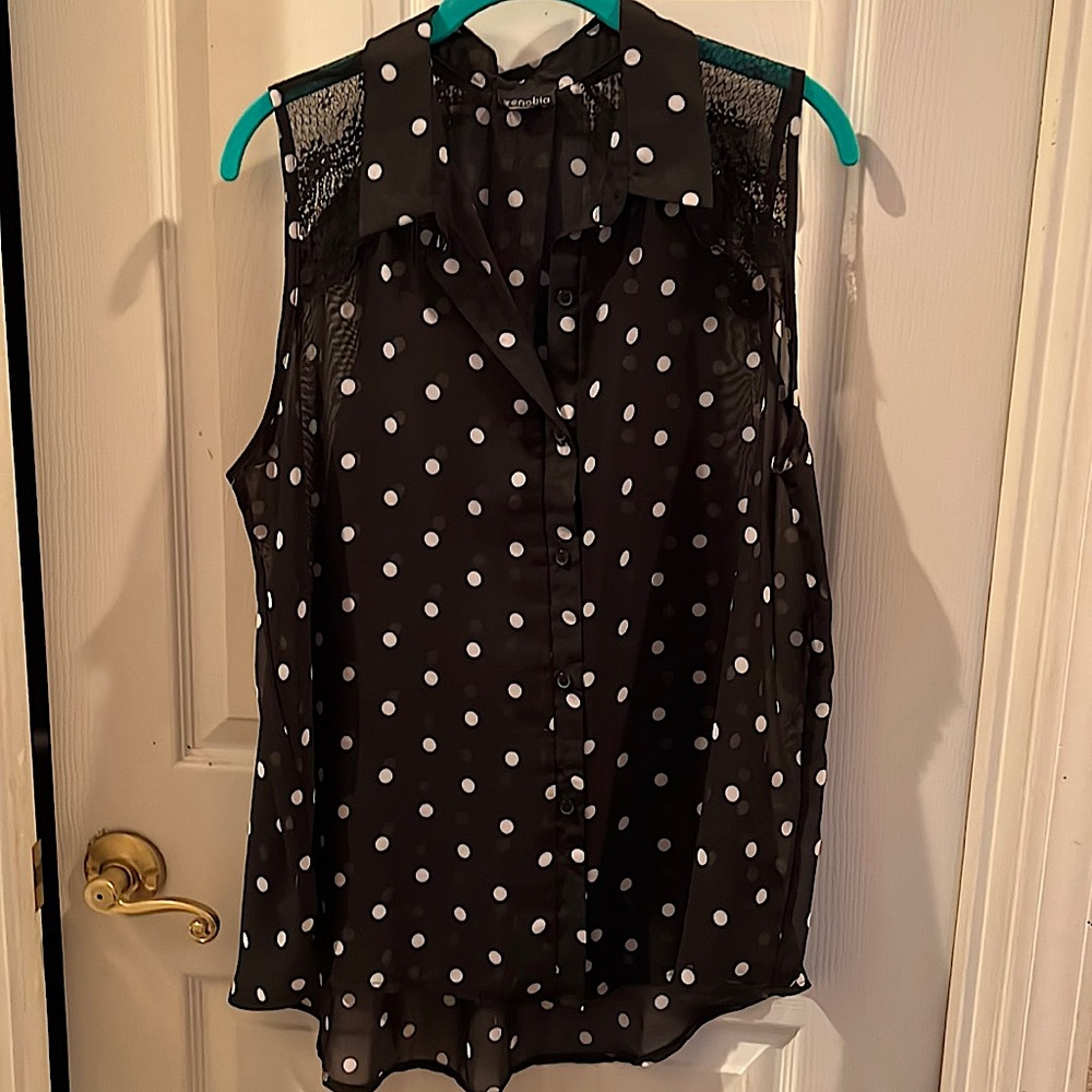 Black sleeveless blouse with lace trim